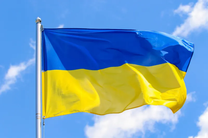 flag of ukraine on a background of blue sky