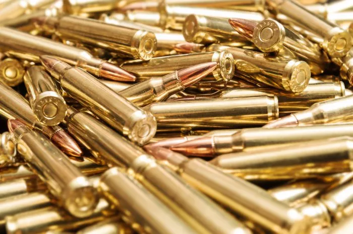 pile of golden rifle cartridges