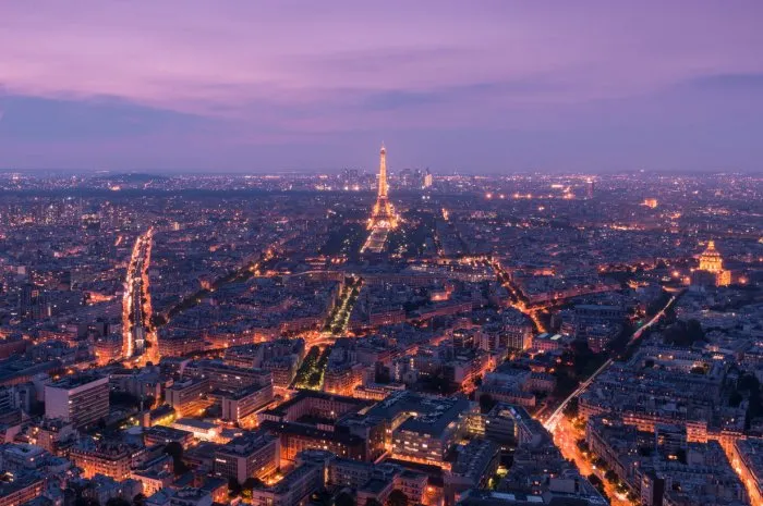 paris, france - august 28, 2013  an aerial view of the city of paris, france at dusk with the eiffel tower in the centre