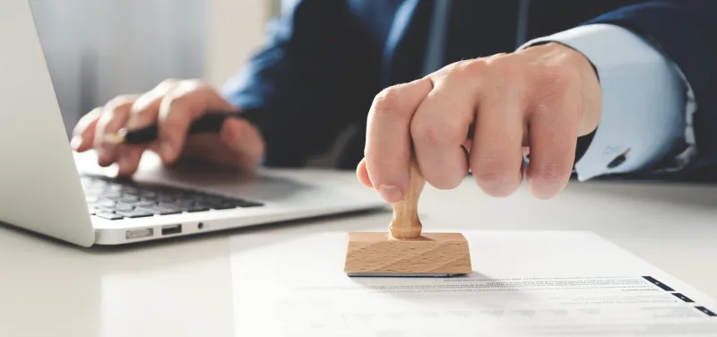 businessman stamps the documents concept of contract, consent, clerk working in the office