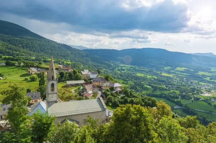 provence landscape in france small town on the top of the hill surrounded by high mountains summer vacation in social isolation