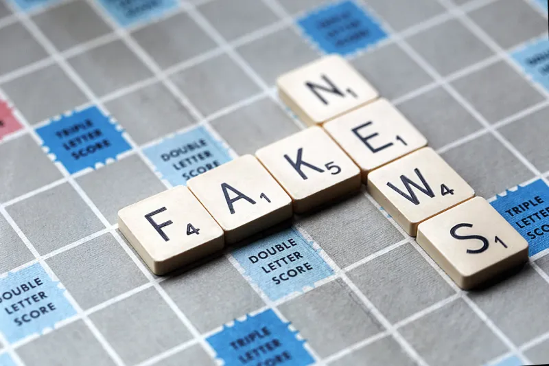 london, uk  january 31, 2017  a scrabble game board with the letters forming the words 'fake news' scrabble is a fun and educational game distributed worldwide by hasbro