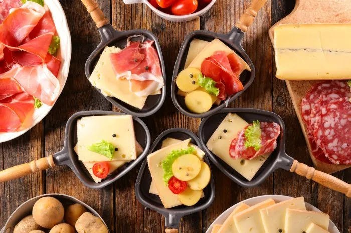 raclette cheese party and ingredients