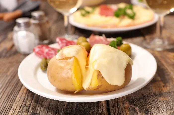 raclette cheese melting on potato