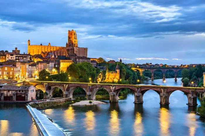 albi featuring the sainte-cecile cathedral and the old bridge over the river tarn unesco world heritage in france