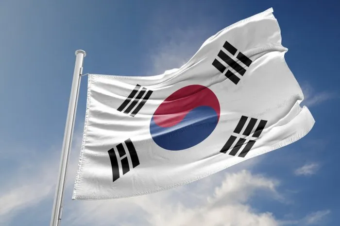 south korea flag is waving at a beautiful and peaceful sky in day time while sun is shining 3d rendering