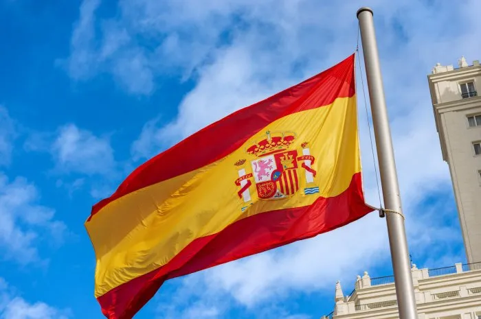 close-up of a spanish flag blowing in the wind in spain square (plaza de espana), madrid downtown, spain, southern europe