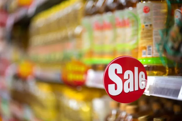 sign of sale wording at consumer good's shelf in the supermarket or grocery that used to demonstrate all goods on this shelf are in special price promotion