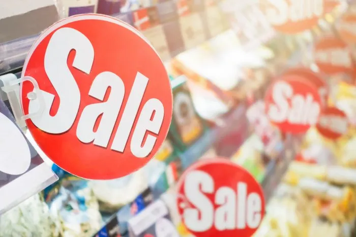 the sale labels with the red circle and the text on them usually use in the supermarket to show when having price reduction and promotion