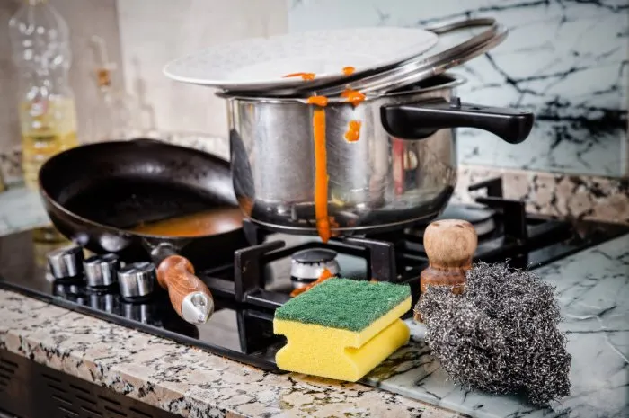 messy kitchen with dirty cookware, a single lifestyle concept