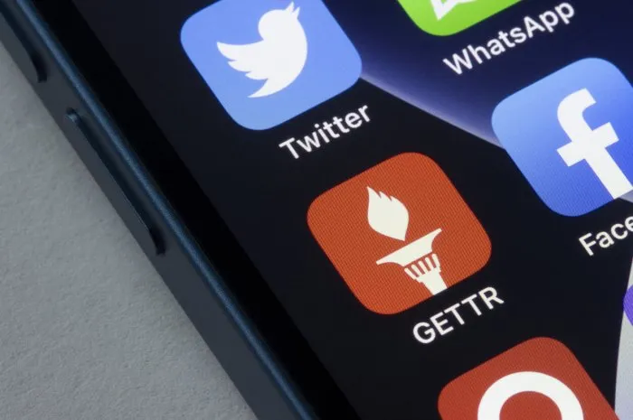 portland, or, usa - jan 5, 2022  gettr app icon is seen on an iphone gettr is a right-wing social media platform and microblogging site founded by jason miller, a former donald trump aide