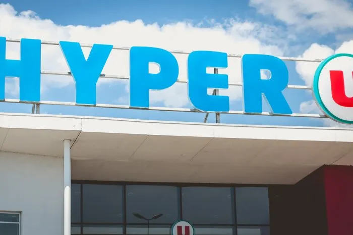 saint hilaire de riez, france - july 31, 2016  architectural detail of the facade of a hypermarket hyper u during the summer