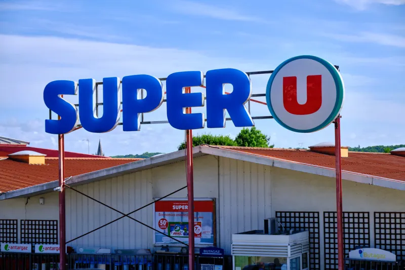 urdax, france, june 8, 2019  french supermarket super u store sign above store entrance