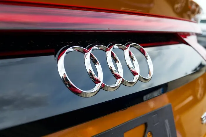 prague, czech republic - september 22, 2018  audi company logo on car on september 22, 2018 in prague, czech republic