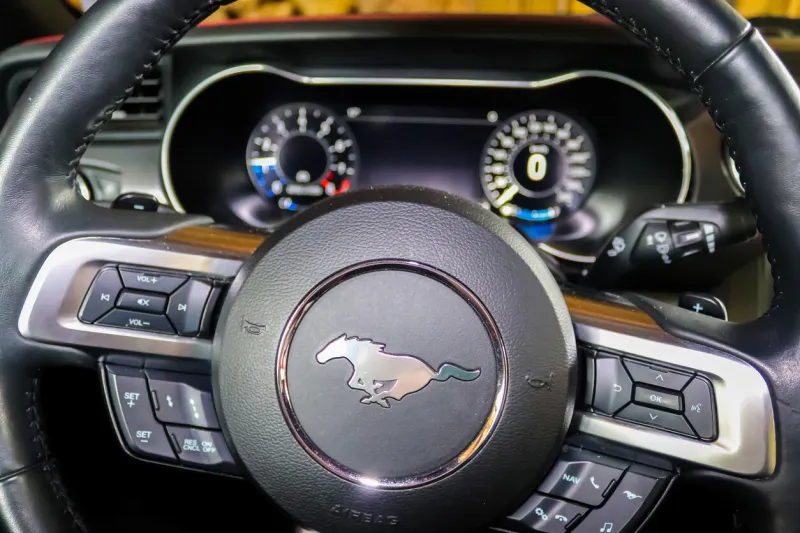 kiel, germany – november 14, 2020  view into the cockpit at the instruments of a ford mustang model 2018 - muscle car usa