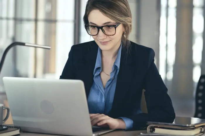 young businesswoman using laptop computer in the office