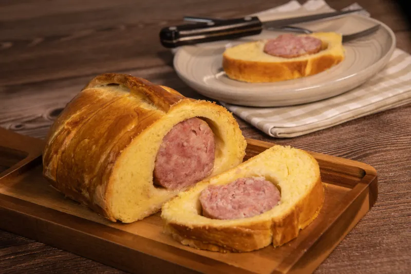 lyonnais brioche baked with sausage style rustic, morteau sausage, high quality photo