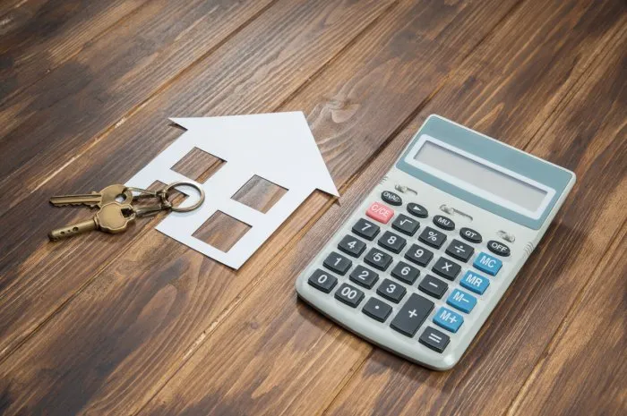 mortgage calculator, house and key with calculator