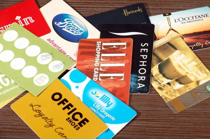 london, united kingdom - march 15, 2021  large pile of advantage loyalty shopping cards used in various retail shops for discounts and other perks