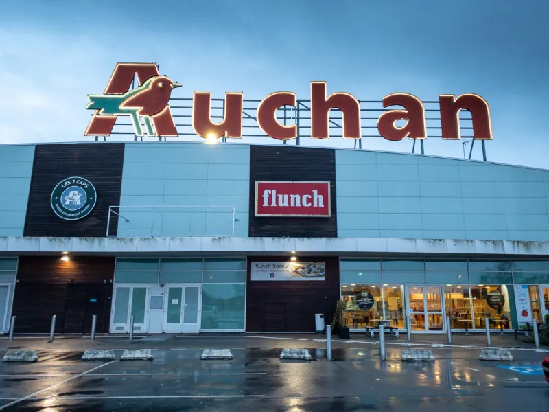 calais, france - january 14, 2020   auchan hypermarket auchan is a french international supermarket chain, is one of the largest distribution groups in the world