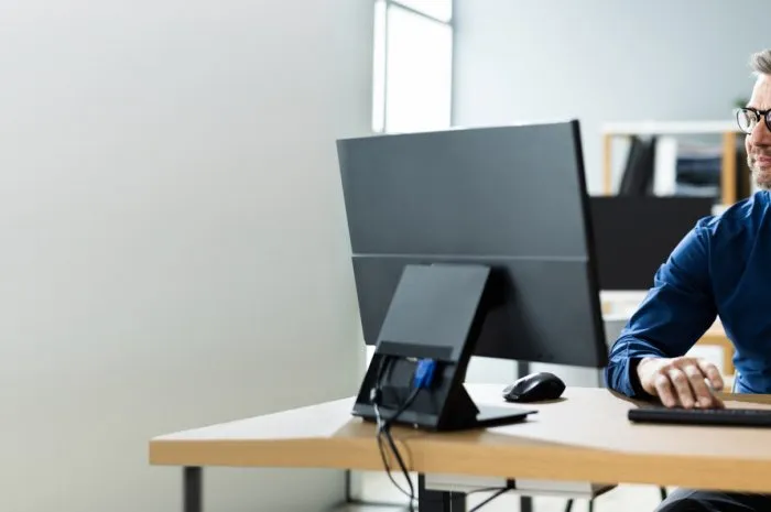 businessman using business computer in office or workplace