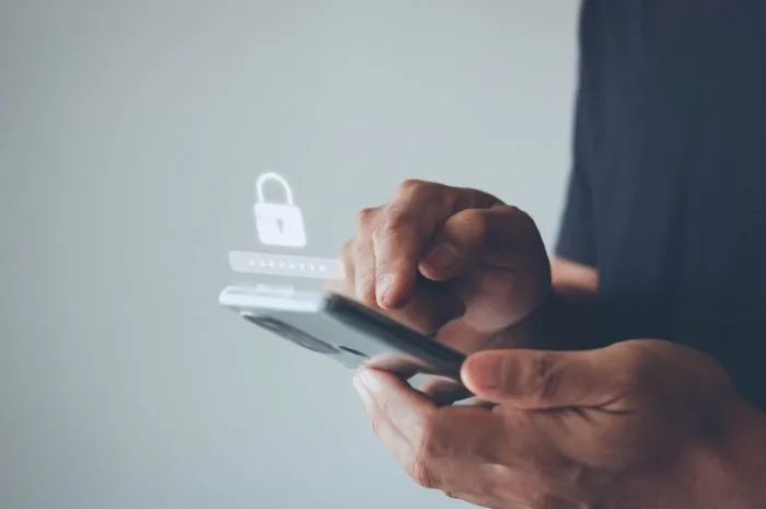 asian businessman using the smart mobile phone to access on smartphone for validate password for biometric two steps authentication to unlock security, business technology security concept