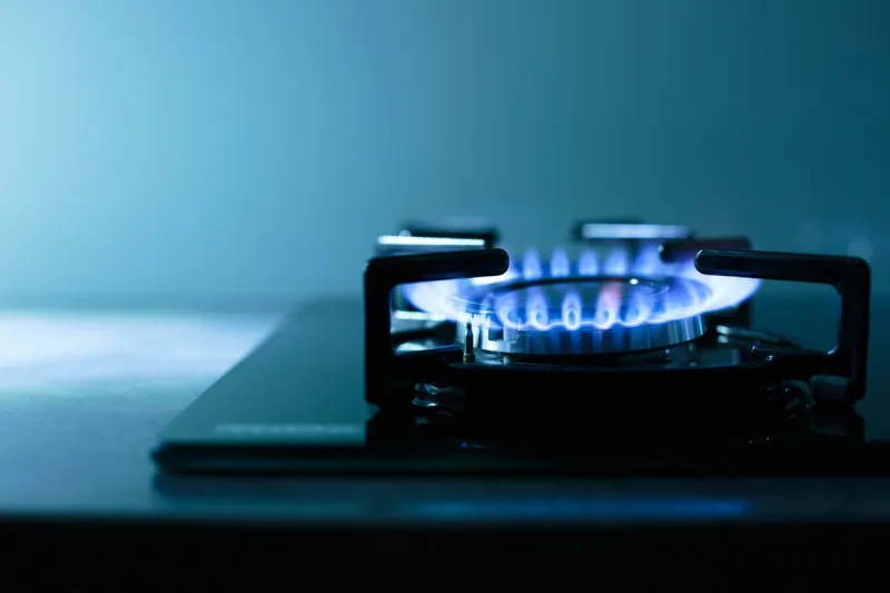 ffames of dark gas stove cooker (shallow dof)