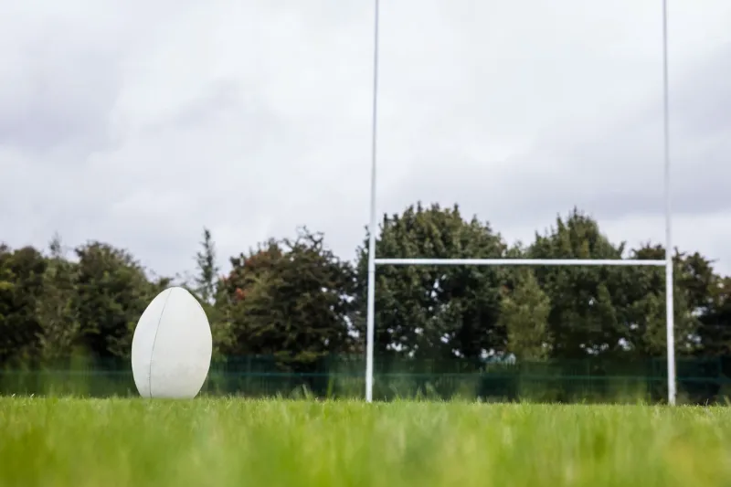 rugby ball on the pitch at the park