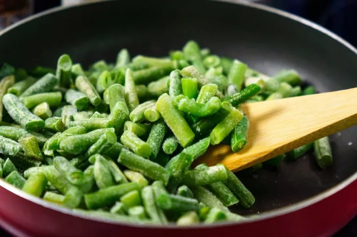 frozen organic green beans healthy food concept, cooking background selective focus