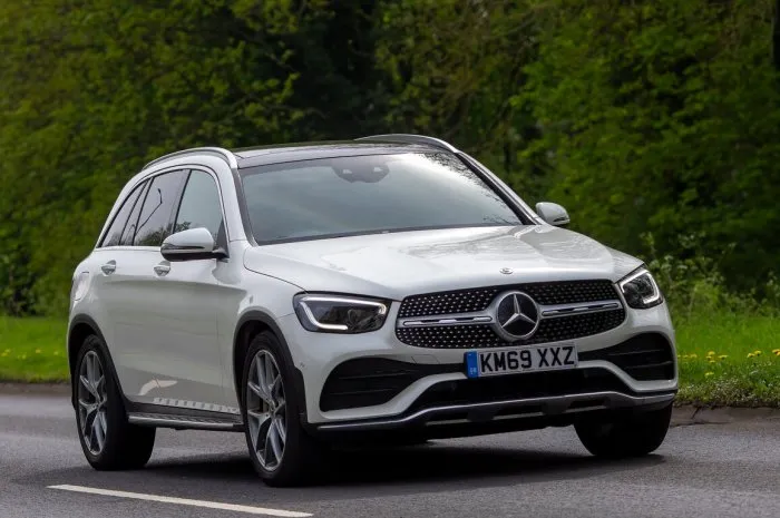 stony stratford,bucks,uk - april 30th 2023 2019 white mercedes-benz glc 300 amg travelling on an english country road