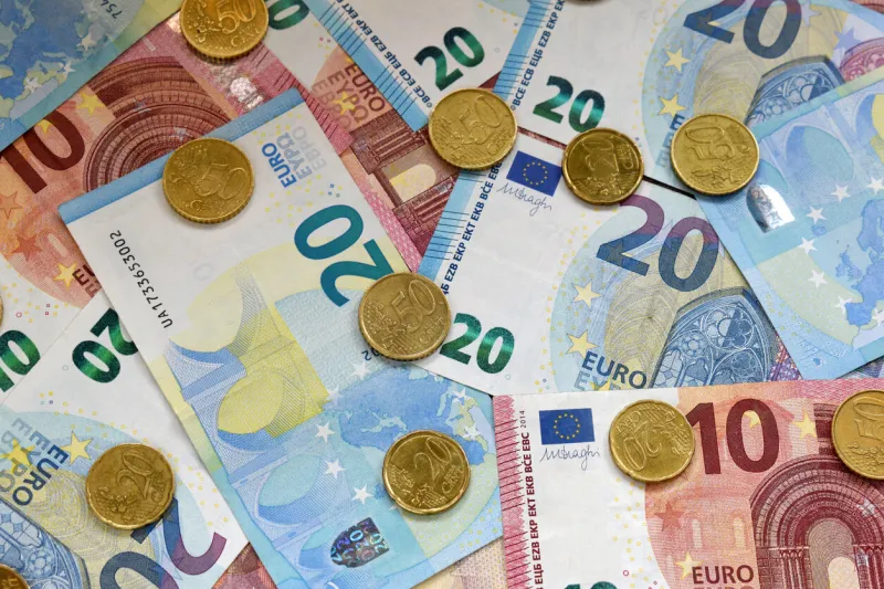 euros notebanks and coins in close up