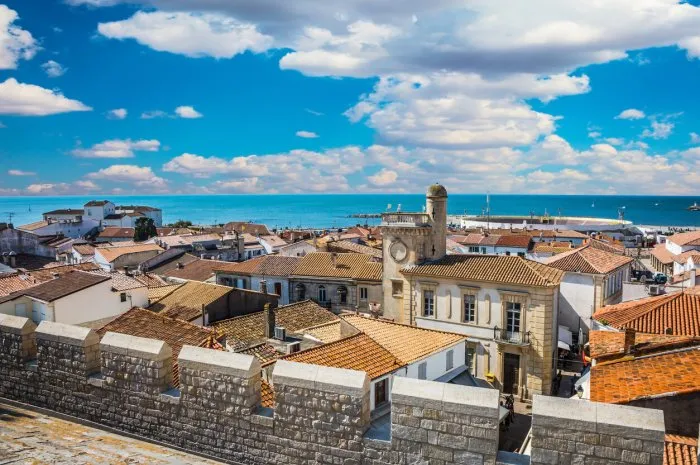 conical roof of the cathedral morning in provencal city saintes-maries-de-la-mer the concept of ethnographic and extreme tourism