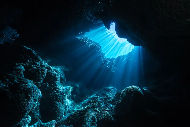 rays of sunlight into the underwater cave in miyakojima island