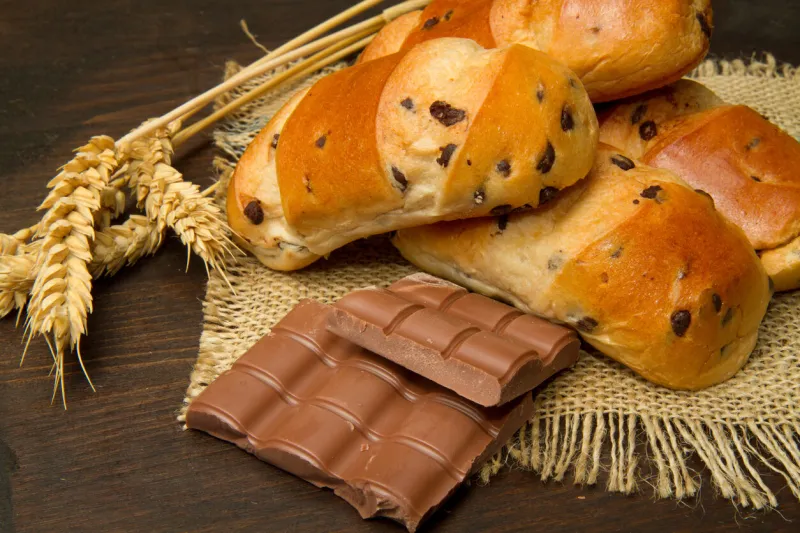 a chocolate brioche served with raisin buns