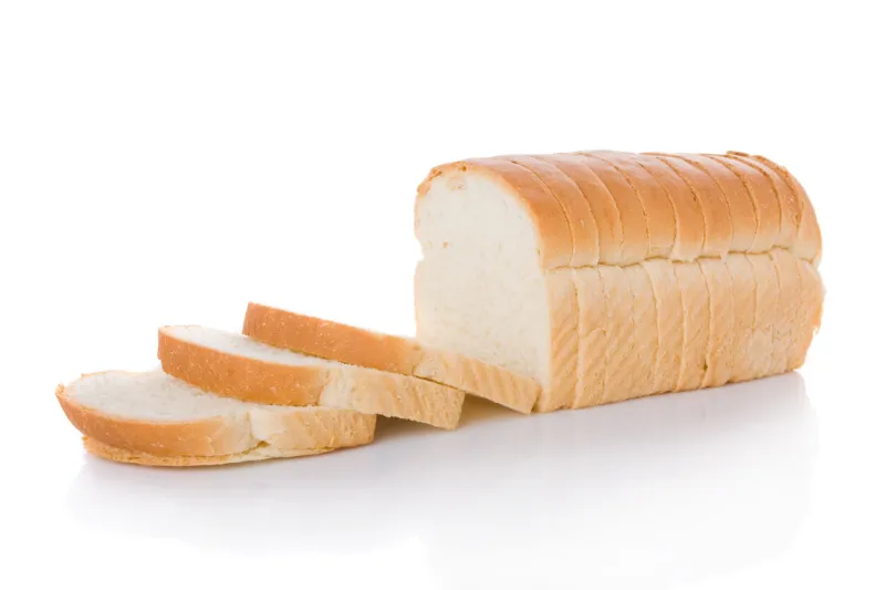 sliced loaf of bread isolated on white