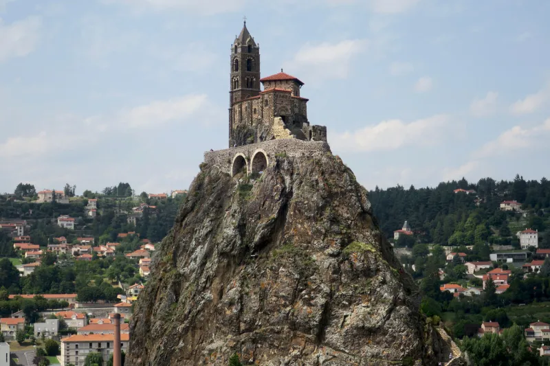 view of the chapel of saint-michel d'aiguilhe in the outskirts of le puy en velay it was built in the 10th century over a volcanic rock and it was a popular pilgrimage spot during the middle ages