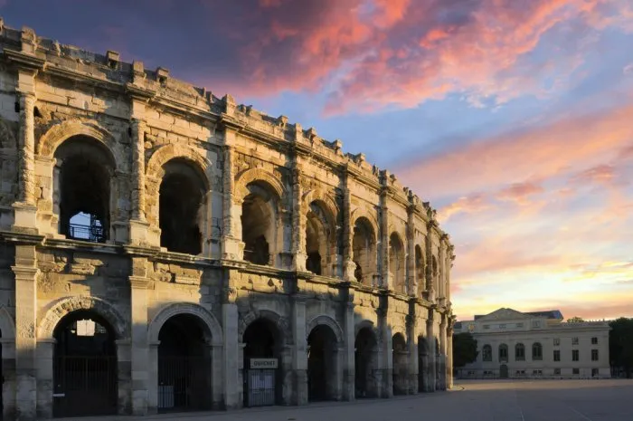 view of famous amphitheater in the morning, nimes city , france
