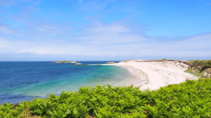 panoramic view of the beautiful beach of ile saint nicolas, main island of the famous glénan archipelago located off the brittany coast of concarneau in the morbihan department in western france