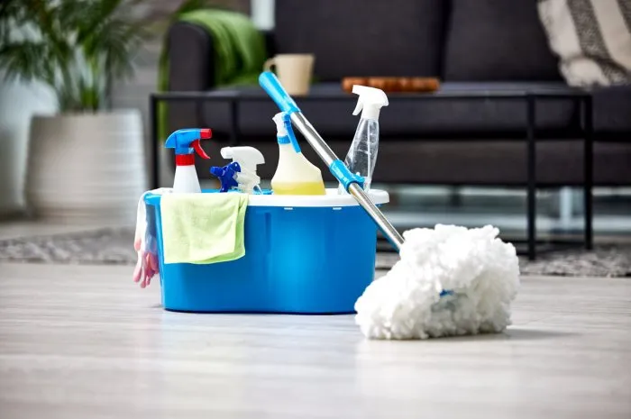 shot of a bucket of cleaning supplies