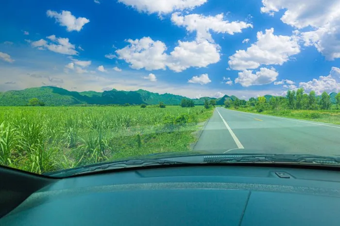 view of a car running on the road