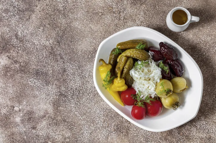 a plate of pickled vegetables