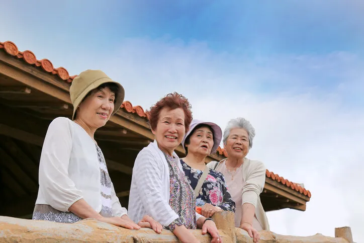 elderly people are looking at the landscape