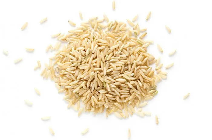 brown rice from above isolated on white background