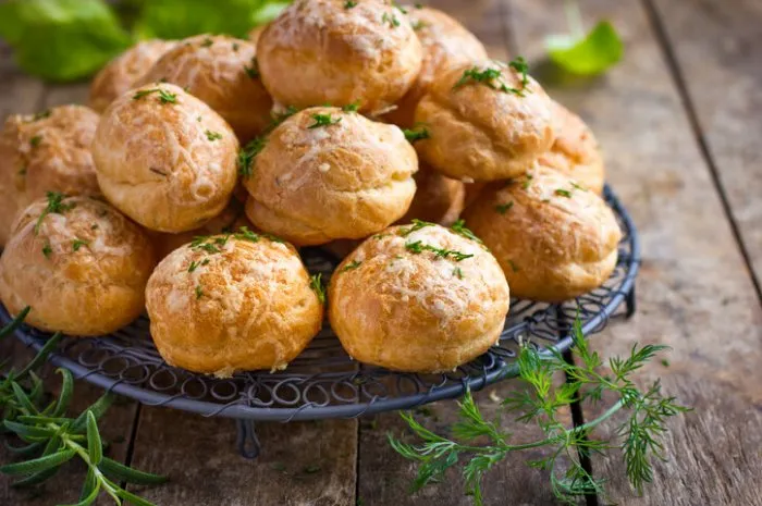 gougeres traditional french cheese choux buns wooden background