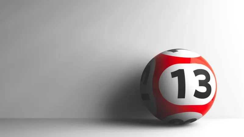 red lottery ball with number 13 on grey background, three-dimensional rendering, 3d illustration
