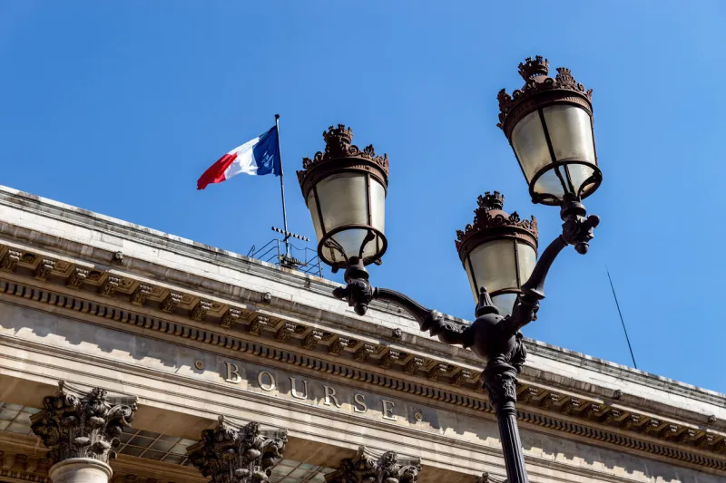 paris, france - september 02 2019  paris bourse stock exchange building (brongniart palace) with streetlamp in foreground