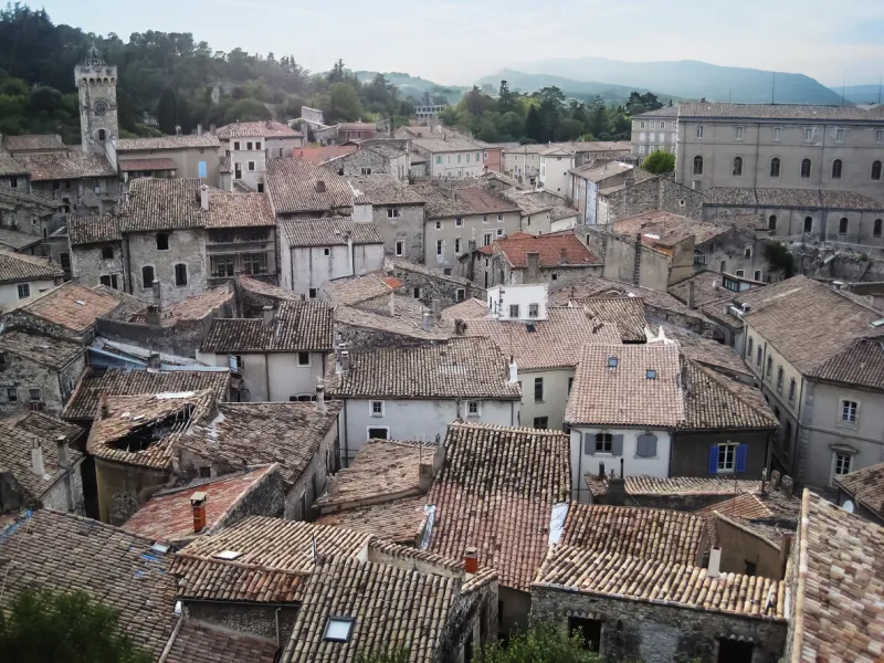red,brown rooftops of houses in the town motelimar in france,europe,hot,summer day