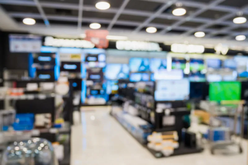 eletronic department store show television tv and home appliance with bokeh light blurred background