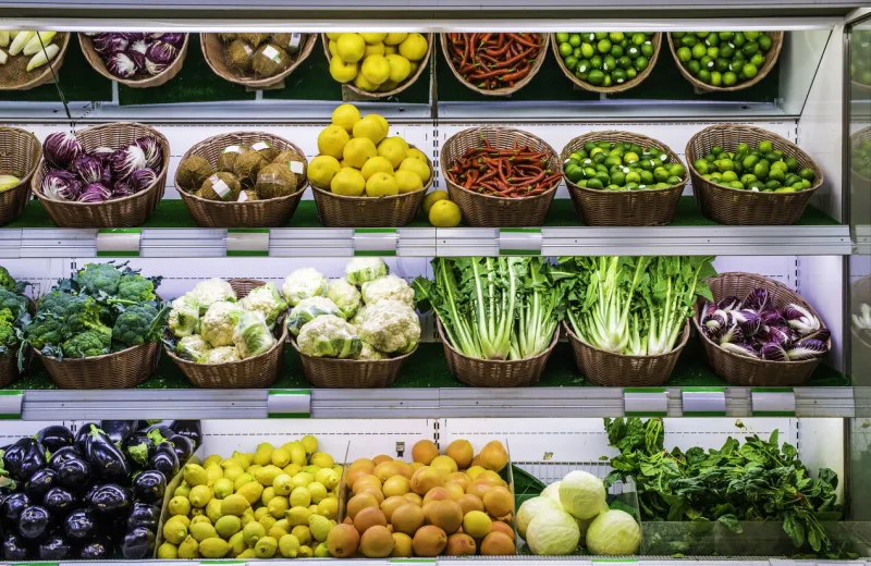 fruits and vegetables on a supermarket shelf