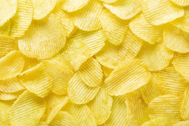 background corrugated golden chips with texture